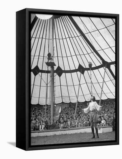 Crowds Watching a Circus Performer-Yale Joel-Framed Premier Image Canvas