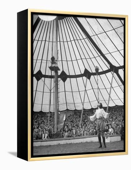 Crowds Watching a Circus Performer-Yale Joel-Framed Premier Image Canvas