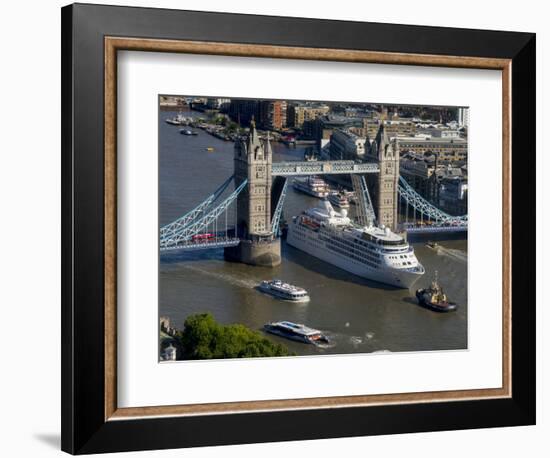 Cruise liner passes through opened Tower Bridge, London-Charles Bowman-Framed Photographic Print