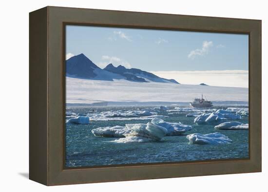 Cruise ship behind icebergs, Brown Bluff, Tabarin Peninsula, Antarctica, Polar Regions-Michael Runkel-Framed Premier Image Canvas