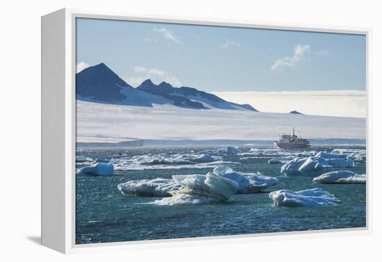 Cruise ship behind icebergs, Brown Bluff, Tabarin Peninsula, Antarctica, Polar Regions-Michael Runkel-Framed Premier Image Canvas