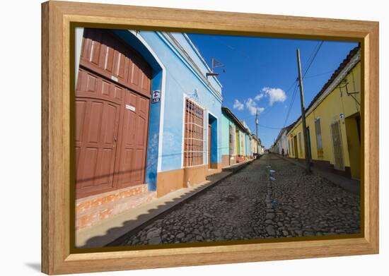 Cuba. Casa Particulares Line the Street, Shown by their Particular Logo Above the Street Number-Inger Hogstrom-Framed Premier Image Canvas