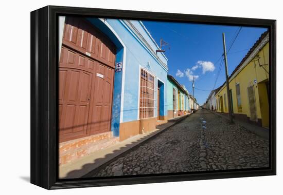 Cuba. Casa Particulares Line the Street, Shown by their Particular Logo Above the Street Number-Inger Hogstrom-Framed Premier Image Canvas