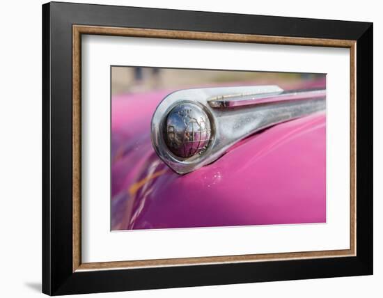 Cuba, Havana. Globe hood ornament on pink classic car.-Jaynes Gallery-Framed Photographic Print