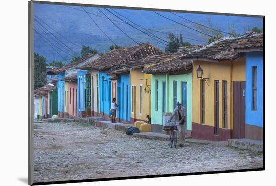 Cuba, Trinidad, a Man Selling Sandwiches Up a Colourful Street in Historical Center-Jane Sweeney-Mounted Photographic Print