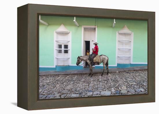 Cuba, Trinidad, Milkman on Horseback Delivers Bottles of Milk to House-Jane Sweeney-Framed Premier Image Canvas