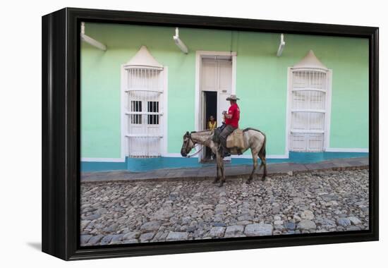 Cuba, Trinidad, Milkman on Horseback Delivers Bottles of Milk to House-Jane Sweeney-Framed Premier Image Canvas