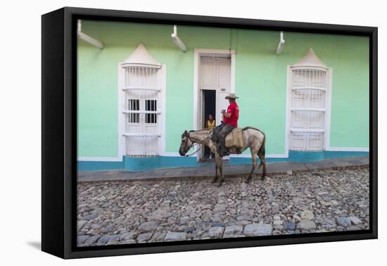 Cuba, Trinidad, Milkman on Horseback Delivers Bottles of Milk to House-Jane Sweeney-Framed Premier Image Canvas