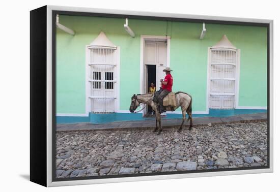 Cuba, Trinidad, Milkman on Horseback Delivers Bottles of Milk to House-Jane Sweeney-Framed Premier Image Canvas