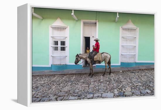 Cuba, Trinidad, Milkman on Horseback Delivers Bottles of Milk to House-Jane Sweeney-Framed Premier Image Canvas