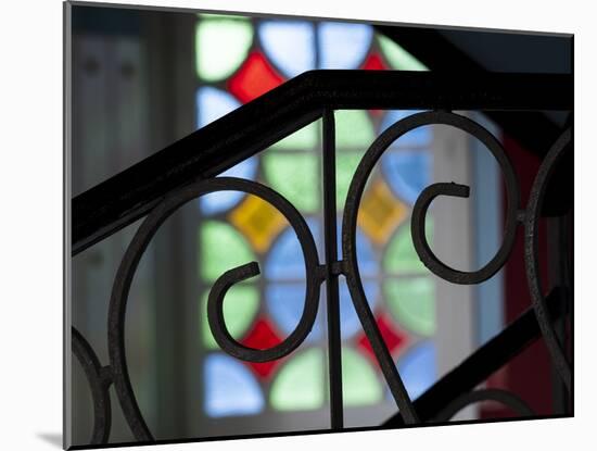 Cuba, Vinales, wrought iron railing and stained glass window.-Merrill Images-Mounted Photographic Print