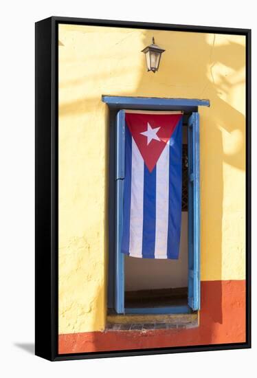 Cuban Flag in doorway, Trinidad, Sancti Spiritus, Cuba-Ed Hasler-Framed Stretched Canvas