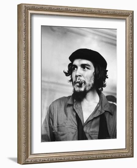 Cuban Rebel Ernesto "Che" Guevara with Lit Cigar Clenched Between Teeth and Left Arm in a Sling-Joe Scherschel-Framed Premium Photographic Print