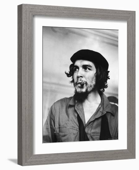 Cuban Rebel Ernesto "Che" Guevara with Lit Cigar Clenched Between Teeth and Left Arm in a Sling-Joe Scherschel-Framed Premium Photographic Print