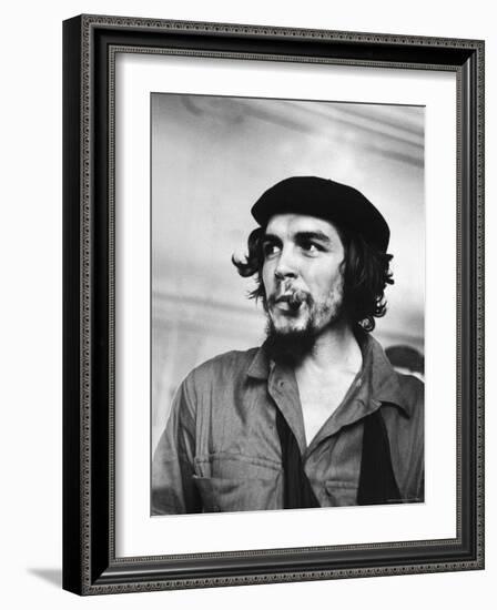 Cuban Rebel Ernesto "Che" Guevara with Lit Cigar Clenched Between Teeth and Left Arm in a Sling-Joe Scherschel-Framed Premium Photographic Print