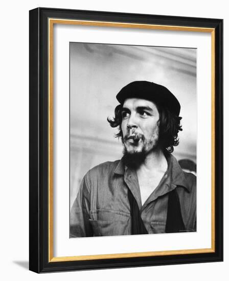 Cuban Rebel Ernesto "Che" Guevara with Lit Cigar Clenched Between Teeth and Left Arm in a Sling-Joe Scherschel-Framed Premium Photographic Print