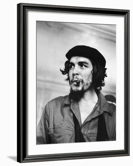 Cuban Rebel Ernesto "Che" Guevara with Lit Cigar Clenched Between Teeth and Left Arm in a Sling-Joe Scherschel-Framed Premium Photographic Print