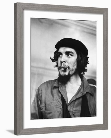 Cuban Rebel Ernesto "Che" Guevara with Lit Cigar Clenched Between Teeth and Left Arm in a Sling-Joe Scherschel-Framed Premium Photographic Print