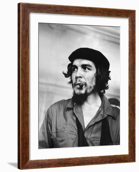 Cuban Rebel Ernesto "Che" Guevara with Lit Cigar Clenched Between Teeth and Left Arm in a Sling-Joe Scherschel-Framed Premium Photographic Print