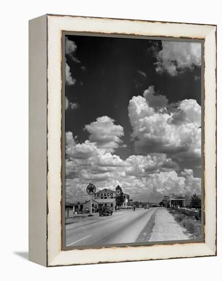 Cumulus Clouds Billowing over Texaco Gas Station along a Stretch of Highway US 66-Andreas Feininger-Framed Premier Image Canvas
