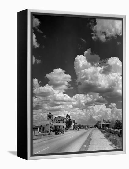 Cumulus Clouds Billowing over Texaco Gas Station along a Stretch of Highway US 66-Andreas Feininger-Framed Premier Image Canvas
