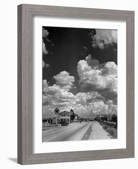 Cumulus Clouds Billowing over Texaco Gas Station along a Stretch of Highway US 66-Andreas Feininger-Framed Premium Photographic Print