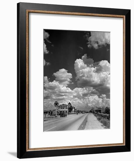 Cumulus Clouds Billowing over Texaco Gas Station along a Stretch of Highway US 66-Andreas Feininger-Framed Premium Photographic Print