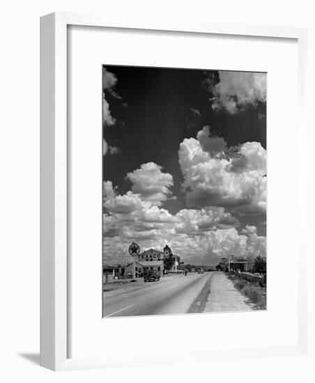 Cumulus Clouds Billowing over Texaco Gas Station along a Stretch of Highway US 66-Andreas Feininger-Framed Premium Photographic Print