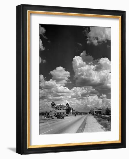 Cumulus Clouds Billowing over Texaco Gas Station along a Stretch of Highway US 66-Andreas Feininger-Framed Premium Photographic Print