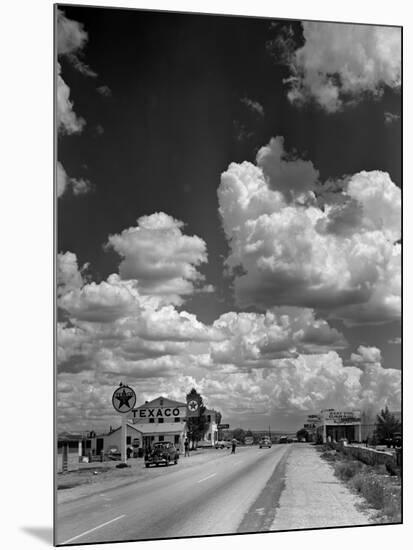 Cumulus Clouds Billowing over Texaco Gas Station along a Stretch of Highway US 66-Andreas Feininger-Mounted Premium Photographic Print