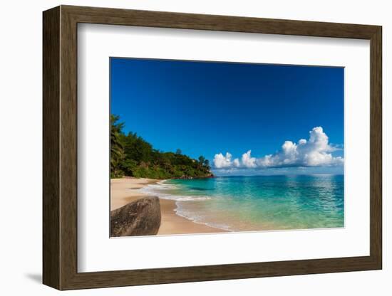 Cumulus clouds off the shore of a pristine tropical beach. Mahe Island, The Republic of Seychelles.-Sergio Pitamitz-Framed Photographic Print