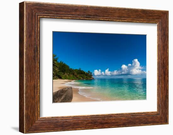 Cumulus clouds off the shore of a pristine tropical beach. Mahe Island, The Republic of Seychelles.-Sergio Pitamitz-Framed Photographic Print
