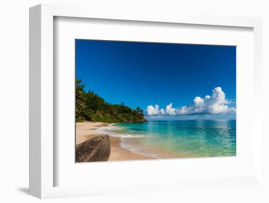 Cumulus clouds off the shore of a pristine tropical beach. Mahe Island, The Republic of Seychelles.-Sergio Pitamitz-Framed Photographic Print