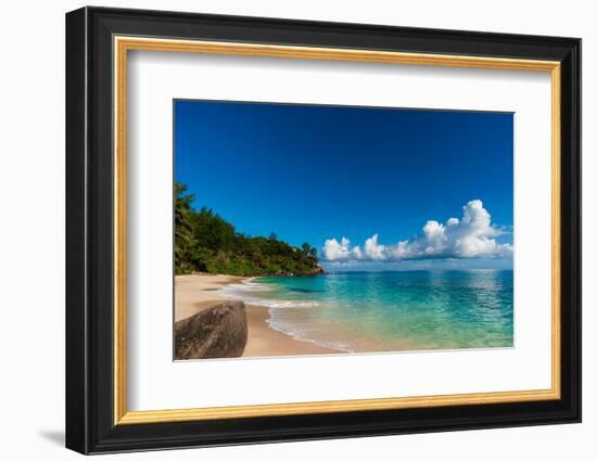 Cumulus clouds off the shore of a pristine tropical beach. Mahe Island, The Republic of Seychelles.-Sergio Pitamitz-Framed Photographic Print