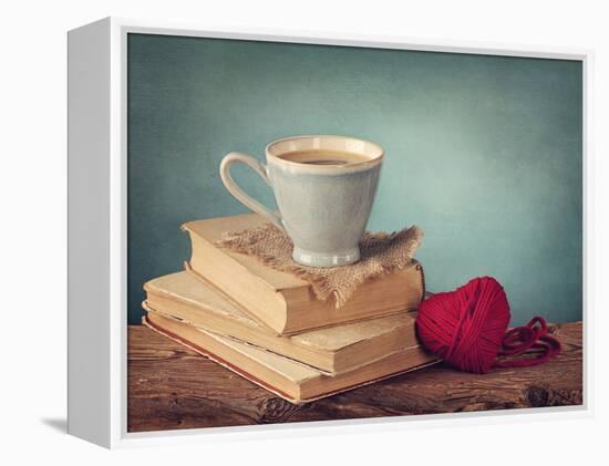 Cup of Coffee Standing on Old Books and Wool Heart-egal-Framed Premier Image Canvas