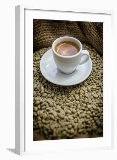 Cup of Espresso on a Sack with Unroasted Coffee Beans-Bernd Wittelsbach-Framed Photographic Print