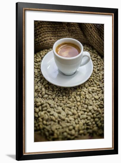 Cup of Espresso on a Sack with Unroasted Coffee Beans-Bernd Wittelsbach-Framed Photographic Print
