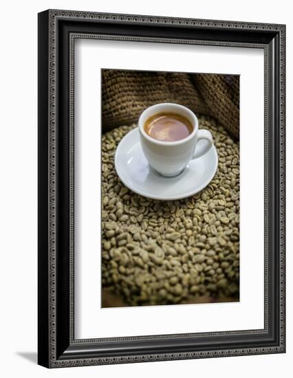 Cup of Espresso on a Sack with Unroasted Coffee Beans-Bernd Wittelsbach-Framed Photographic Print