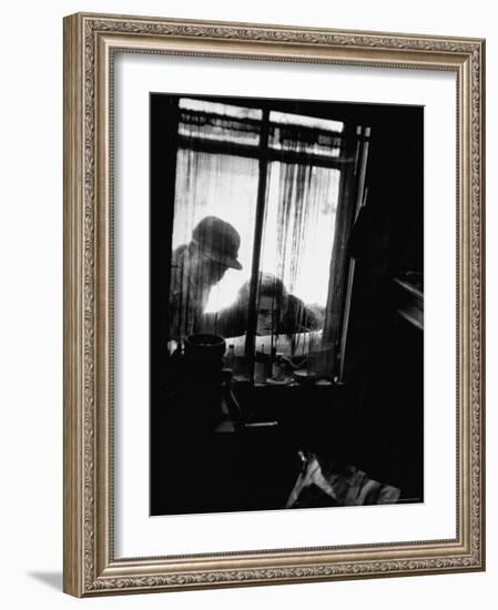 Curiosity Seekers Peering Into Kitchen Window at Alleged Mass Murderer Ed Gein's House-Frank Scherschel-Framed Photographic Print