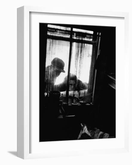 Curiosity Seekers Peering Into Kitchen Window at Alleged Mass Murderer Ed Gein's House-Frank Scherschel-Framed Photographic Print