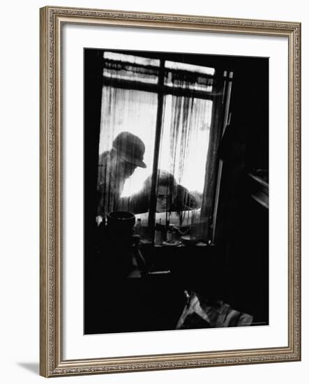 Curiosity Seekers Peering Into Kitchen Window at Alleged Mass Murderer Ed Gein's House-Frank Scherschel-Framed Photographic Print