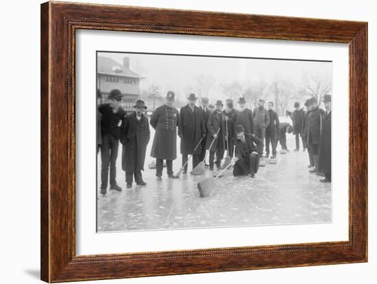 Curling in Central Park with Men Having Brooms at the Ready over the Ice.-null-Framed Art Print