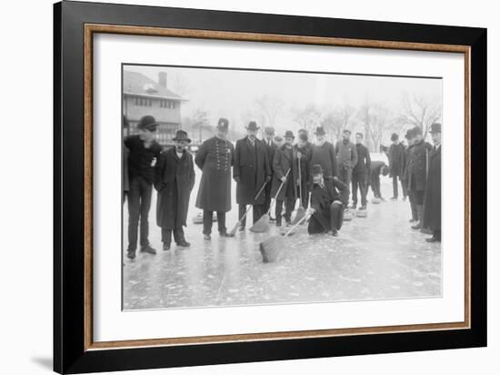 Curling in Central Park with Men Having Brooms at the Ready over the Ice.-null-Framed Art Print