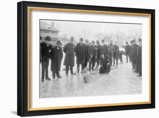 Curling in Central Park with Men Having Brooms at the Ready over the Ice.-null-Framed Art Print