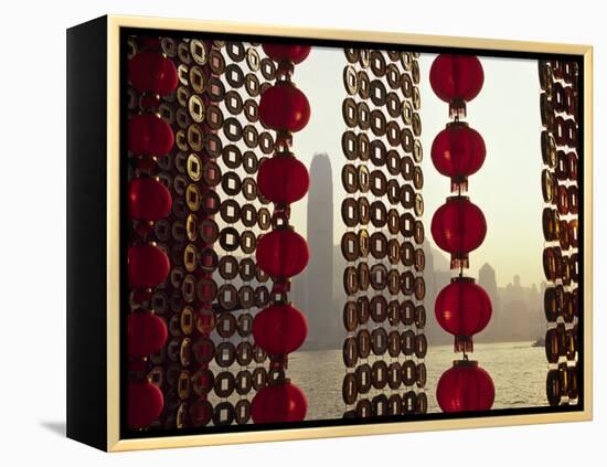 Curtain of Chinese New Year Decorations Frame Victoria Harbour from Tsim Sha Tsui, in Hong Kong-Andrew Watson-Framed Premier Image Canvas