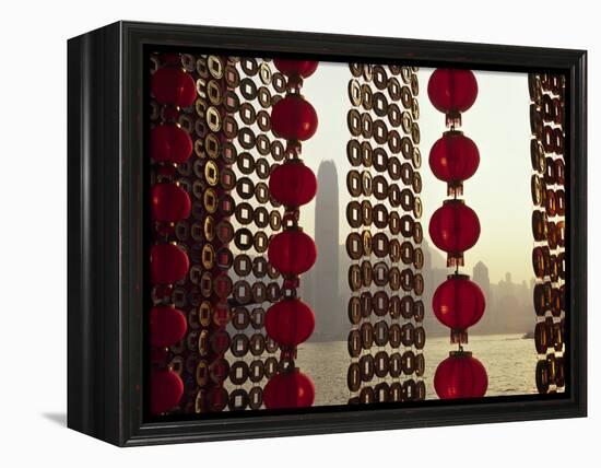 Curtain of Chinese New Year Decorations Frame Victoria Harbour from Tsim Sha Tsui, in Hong Kong-Andrew Watson-Framed Premier Image Canvas