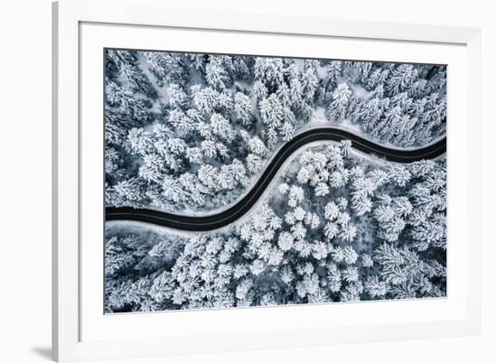 Curvy Windy Road in Snow Covered Forest, Top down Aerial View.-null-Framed Photographic Print