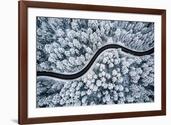 Curvy Windy Road in Snow Covered Forest, Top down Aerial View.-null-Framed Photographic Print