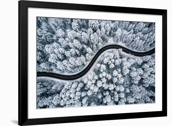 Curvy Windy Road in Snow Covered Forest, Top down Aerial View.-null-Framed Photographic Print