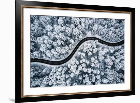 Curvy Windy Road in Snow Covered Forest, Top down Aerial View.-null-Framed Photographic Print